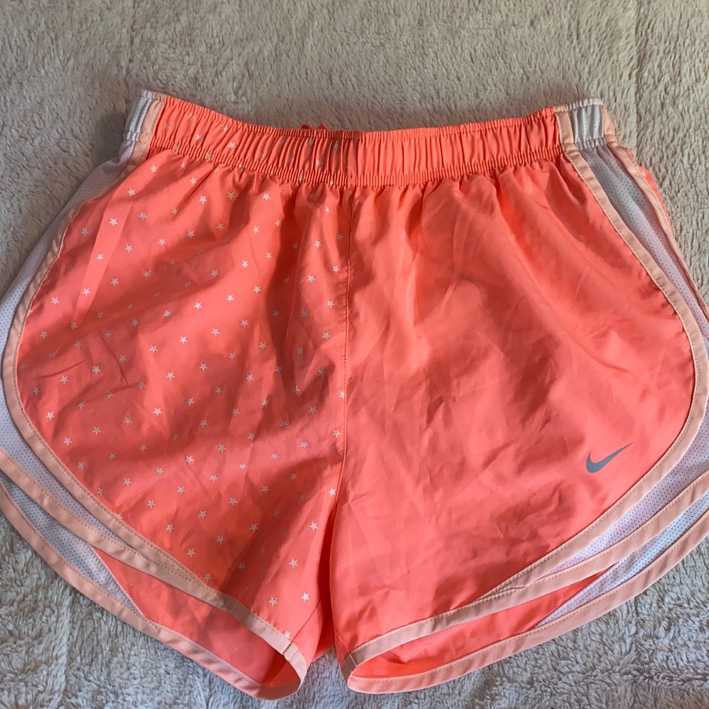 Bright orange running shorts